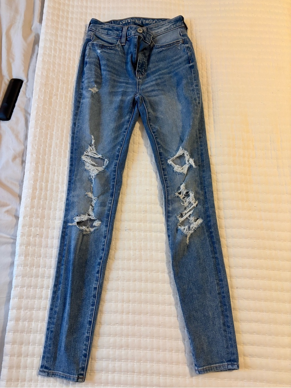 American Eagle Outfitters Light Blue Ripped super high rise jeggings